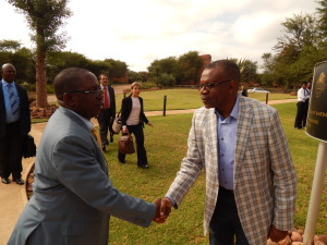 ZAMBIA'S High Commissioner to South Africa, His Excellency Mr. Muyeba Chikonde (r) welcomes Foreign Affairs Deputy Minister, Mr. Rayford Mbulu when he arrived at the venue for the 14th Africa - Nordic Meeting at Legends Golf Safari Resort in Limpopo, South Africa, on Friday, 10th April, 2015.