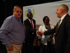 Deputy Minister of Agriculture & Livestock, Mr. Greyford Monde meets Israeli Ambassador to South Africa, Mr. Arthur Lenk. Looking on are Mr. Charl Senekal, a commercial farmer from KwaZulu-Natal, and Ms. Cecilia Khupe of African Fertiliser and Agribusiness Partnership. This was in Pretoria at the symposium and launch of Agri All Africa on 26th August, 2015.