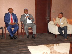 Zambia's High Commissioner Designate to South Africa, His Excellency Mr. Emmanuel Mwamba with former Zambian President Mr. Rupiah Banda chatting at Oliver Tambo International Airport on 8th August, 2015. On the right is out-going Zambia's Deputy High Commissioner to South Africa, Mr. Joe Kaunda